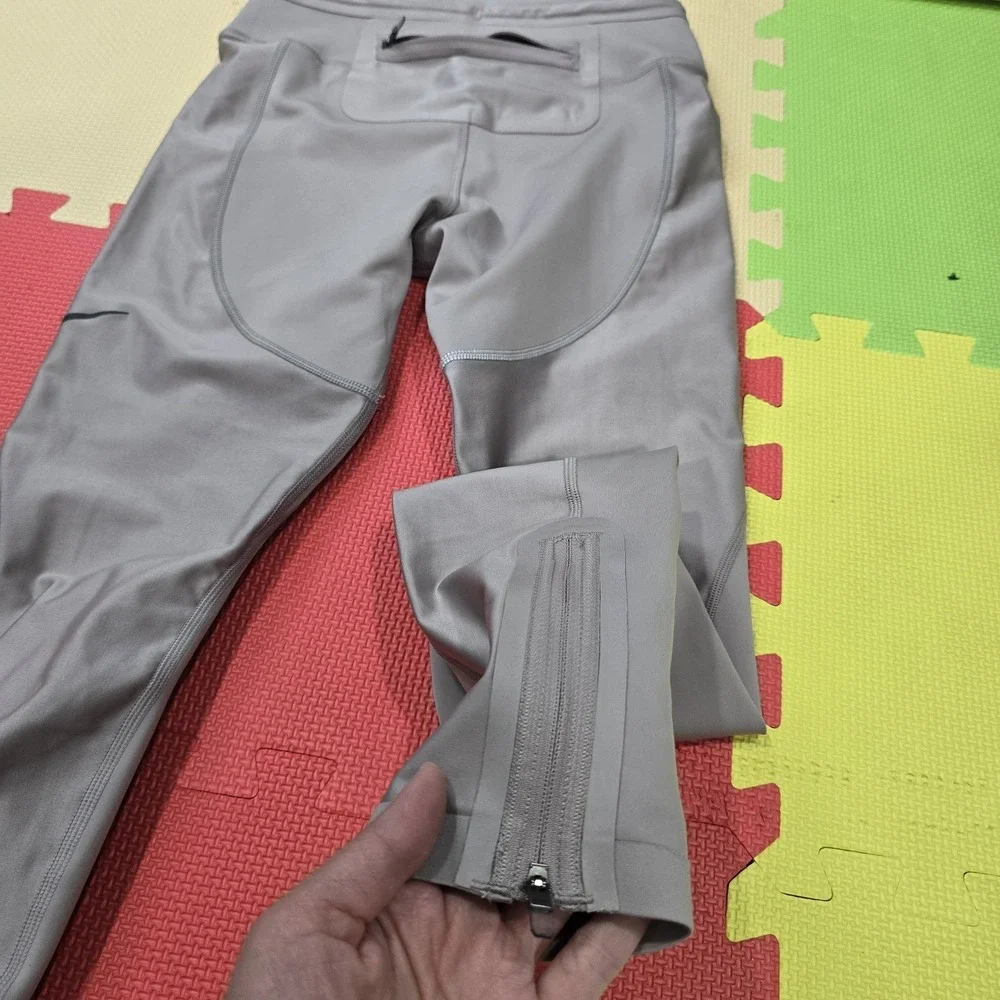 Nike Women's S Dri-FIT‎ Running Leggings Beige Gray Zipper Pockets Ankle Zip